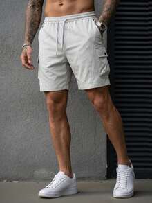 Manfinity CasualCool 男士素色工作風口袋抽繩腰休閒寬鬆短褲 男士短褲 工裝短褲 男士短褲休閒 - 淺灰色 - 查看 5