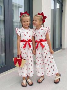 SHEIN Elladie kids 女童數位印花滿版櫻桃圖案連身褲，配紅色腰帶、活力飄逸袖與荷葉邊領設計，柔軟可愛且精緻，適合日常穿著、外出、度假及夏季穿搭 - 白色 - 查看 9