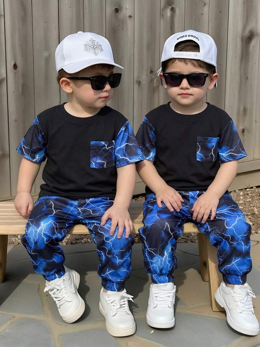 SHEIN 2pcs Kids Tween Boy Casual Comfortable Glow-In-The-Dark Pattern Pullover Short Sleeve T-Shirt Straight Loose Long Pants Knit T-Shirt Set, Tracksuit, Y2K Set, Eid Dress, Ramadan, Traditional Arabic Clothing, Suitable For Spring/Summer, Outfits, Valentine's Day, Date, Travel, Vacation, Family Gathering, Back To School, Wedding Season, Evening Party, Sports, Birthday Party