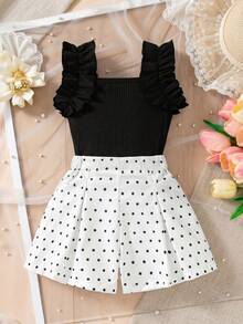Conjunto de ropa infantil de dos piezas con estilo dulce y juguetón, top de camiseta sin mangas con chaleco plisado de punto con rayas, combinado con pantalones cortos de cintura elástica rosa, con exquisitas flores blancas tridimensionales posicionadas, lindo y a la moda, adecuado para la vida diaria en verano - Blanco y Negro - Ver 8