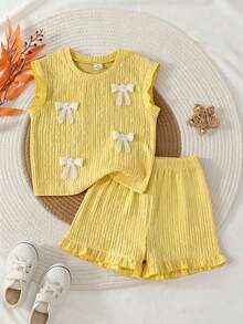 SHEIN Elladie kids 两件套女童提花针织宽松背心套装，配有可爱蕾丝蝴蝶结和荷叶边下摆短裤，适合休闲、度假、运动和夏季穿着。 - 黃色 - 查看 2