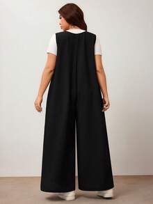 Enliva Mono de pierna ancha para mujer talla grande con lazo delantero y bolsillos, corte holgado, compatible con la figura redondeada tipo manzana - Negro - Ver 2