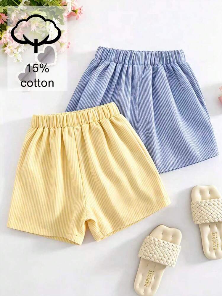 SHEIN Elladie kids 少女 2 件套清新學院風不對稱短褲，藍黃配色，不對稱前包覆設計，兩側附可拆式同布蝴蝶結，適合夏季出遊、日常上學、校園週末旅行、野餐、輕旅行、海邊 - 彩色 - 查看 2