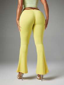 BABYPHAT Low Rise Flared Trousers With Rhinestone Logo Strap Detail, Festival Party Pants - Pale Yellow - View 5