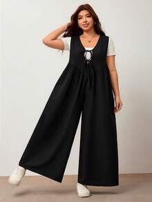 Enliva Mono de pierna ancha para mujer talla grande con lazo delantero y bolsillos, corte holgado, compatible con la figura redondeada tipo manzana - Negro - Ver 7