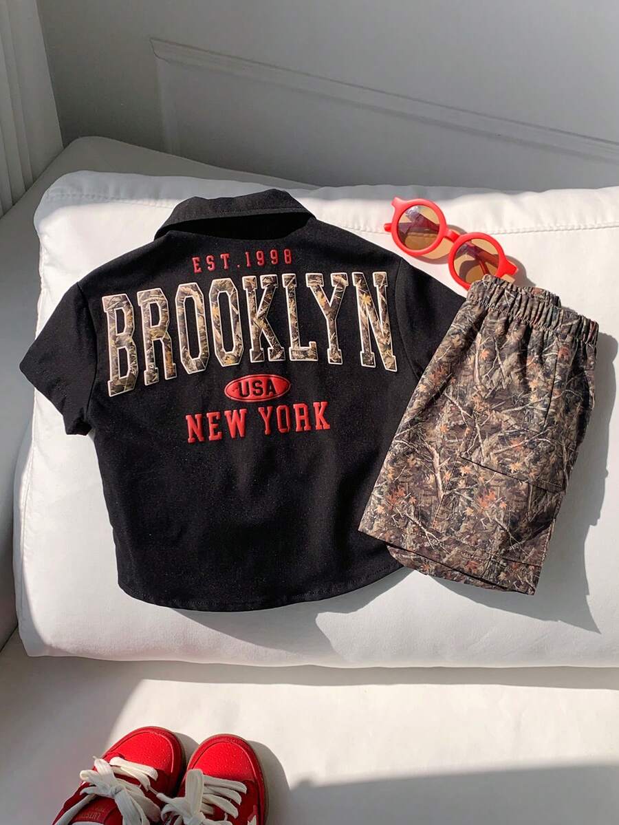SHEIN 2pcs Kidsyoung Boy Summer Cute Casual Black Short Sleeve Shirt Leaf Camouflage Pattern Shorts Set, Camouflage Utility Shirt Set, Suitable For Daily Wear, Suitable For Spring And Summer - Black - View 1