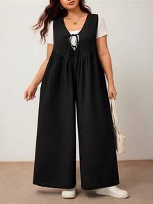 Enliva Mono de pierna ancha para mujer talla grande con lazo delantero y bolsillos, corte holgado, compatible con la figura redondeada tipo manzana - Negro - Ver 5
