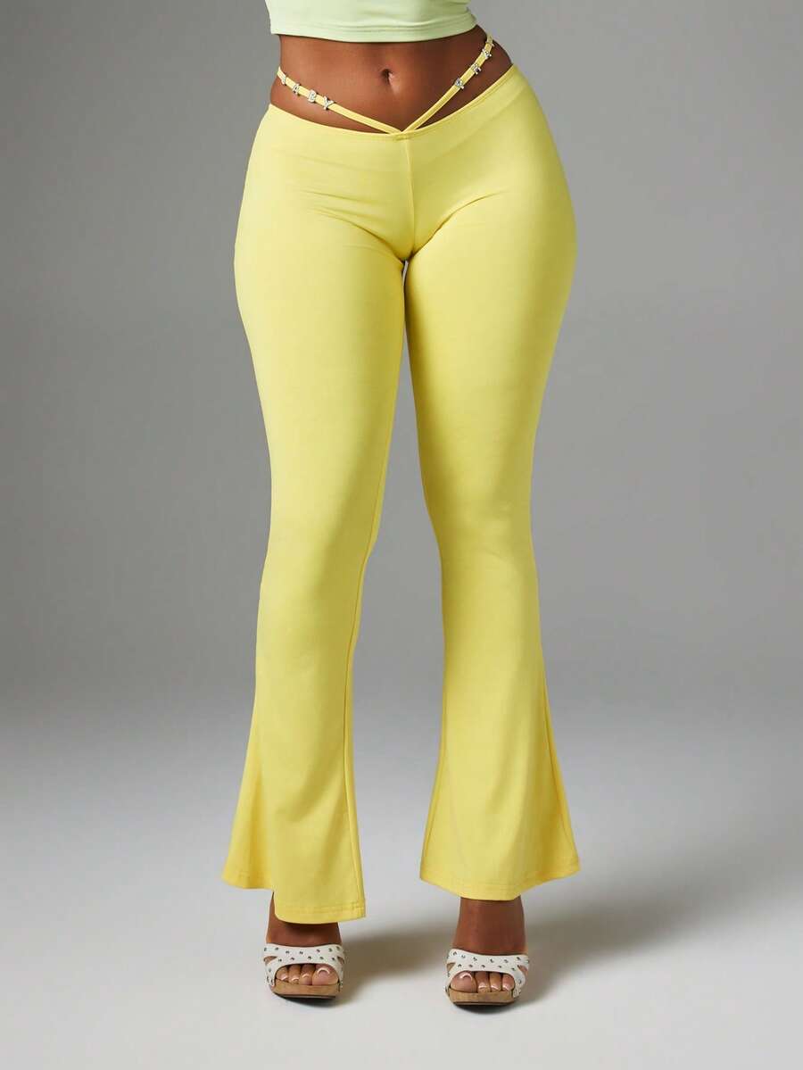 BABYPHAT Low Rise Flared Trousers With Rhinestone Logo Strap Detail, Festival Party Pants - Pale Yellow - View 1