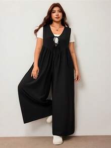 Enliva Mono de pierna ancha para mujer talla grande con lazo delantero y bolsillos, corte holgado, compatible con la figura redondeada tipo manzana - Negro - Ver 3