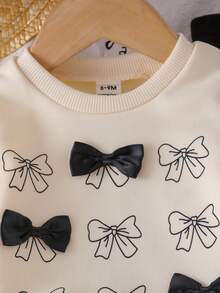 SHEIN Playful Pals 女嬰圓領衛衣套裝，3D蝴蝶結上衣搭配修身長褲，適合外出、居家、校園穿著 - 杏色 - 查看 9