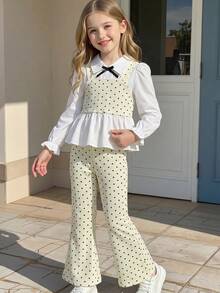 Elladie kids 2件組少女極簡通勤風波點套裝，上衣採一體式2合1結構襯衫，小翻領、收口袖，領口飾細黑蝴蝶結，外層波點短版細肩帶背心，搭配同布料喇叭長褲，俐落修身，微薄，適合校園、日常穿著、逛街、公園穿搭 - 杏色 - 查看 12