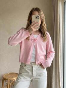 SHEIN 少女鏤空針織開襟衫，適合居家、休閒外出、海灘度假、派對等場合，舒適百搭，柔軟面料。這款粉色女童開襟衫採用繫帶V領與長袖設計，是夏季理想選擇，也是完美的母親節禮物 - 粉色 - 查看 7