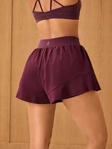 OutZeal Shorts de gimnasia para mujer, shorts deportivos de unicolor para entrenamiento y tenis con shorts incorporados, dobladillo con volantes, prendas inferiores activas para verano y primavera - Burdeos - Ver 6