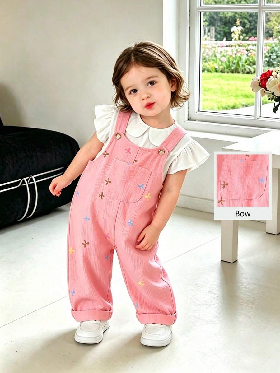 SHEIN Playful Pals 女嬰粉色彩色蝴蝶結印花皺褶布料休閒口袋吊帶褲連身衣單件