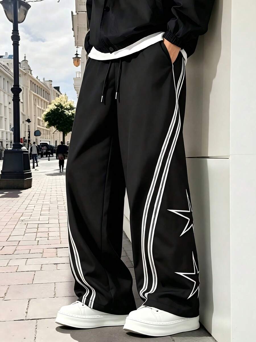 Manfinity Hypemode Men's Casual Versatile Daily Travel Long Pants With Pocket, Star Print And Color Block Design - Black - View 1