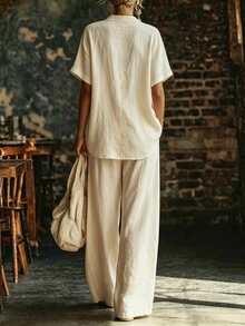 SHEIN Holidaya Newest Women's Early Autumn Textured Crinkled Half-Zip Polo Casual Set, Lapel Half-Zip Short Sleeve Top Paired With Same Fabric Draped Wide Leg Pants, Natural Crinkled Texture, Loose Relaxed Fit, Suitable For Home, Short Trips, Light Commute And Multiple Occasions, Women's Textured Crinkled Polo Collar Half-Zip Two Pieces Set - Apricot - View 3