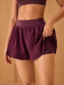 OutZeal Shorts de gimnasia para mujer, shorts deportivos de unicolor para entrenamiento y tenis con shorts incorporados, dobladillo con volantes, prendas inferiores activas para verano y primavera - Burdeos - Ver 7