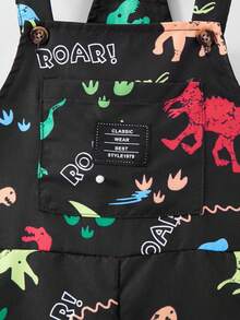 SHEIN Lockerer, bequemer Jumpsuit für kleine Jungen, lässiger, süßer Stil, geeignet für Schule, Sport und Outdoor-Aktivitäten, passend für Jungen von 4 bis 7 Jahren. Cargohose für Kleine Jungen mit süßem Dinosaurier-Muster - Schwarz - Übersicht 8
