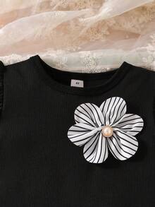 Elladie kids Mädchen Frühling/Sommer Schwarz gestricktes Rundhals T-Shirt mit Rüschenärmeln und gestreifter Vorderseite & Schwarz gewebter einfarbiger Rock mit halber elastischer Taille und 2 Schleifen-Dekor 2 Stücke Set, geeignet für Frühling/Sommer Alltagskleidung, Reisen, Urlaub, Party - Schwarz - Übersicht 4
