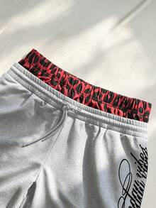 Manfinity Roghcode 男士夏季休閒豹紋拼接字母印花短褲 - 淺灰色 - 查看 3