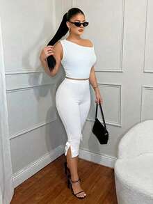 SHEIN SXY Leggings casuales minimalistas blancos de 97% algodón con bajo dividido, largo capri y bordado 3D con lazo - Blanco - Ver 4