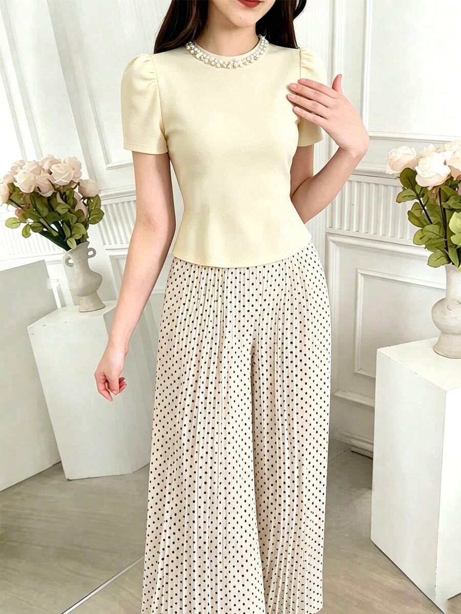 SHEIN Streecool 女童與青少年女孩 2 件套,針織純色珍珠裝飾小立領泡泡短袖 T 恤 + 梭織數位印花波點花苞腰帶直筒百褶長褲附腰帶,適合春夏休閒日常穿著 - 黃色 - 查看 1