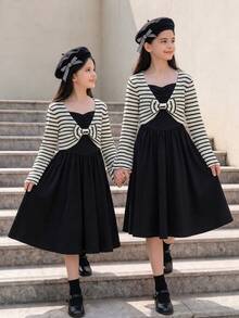 Elladie kids 2件組 青少年女孩甜美風黑白條紋針織短版開襟衫搭配黑色細肩帶洋裝，開襟衫飾有大蝴蝶結，修身收腰大裙擺，溫柔造型，適合日常穿著、約會、休閒出遊，春秋季適中厚度 - 黑色 - 查看 4