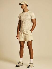 Musero Sport 輕量聚酯纖維健身短褲 後方拉鍊口袋 春夏必備健身運動服 - 米色 - 查看 1