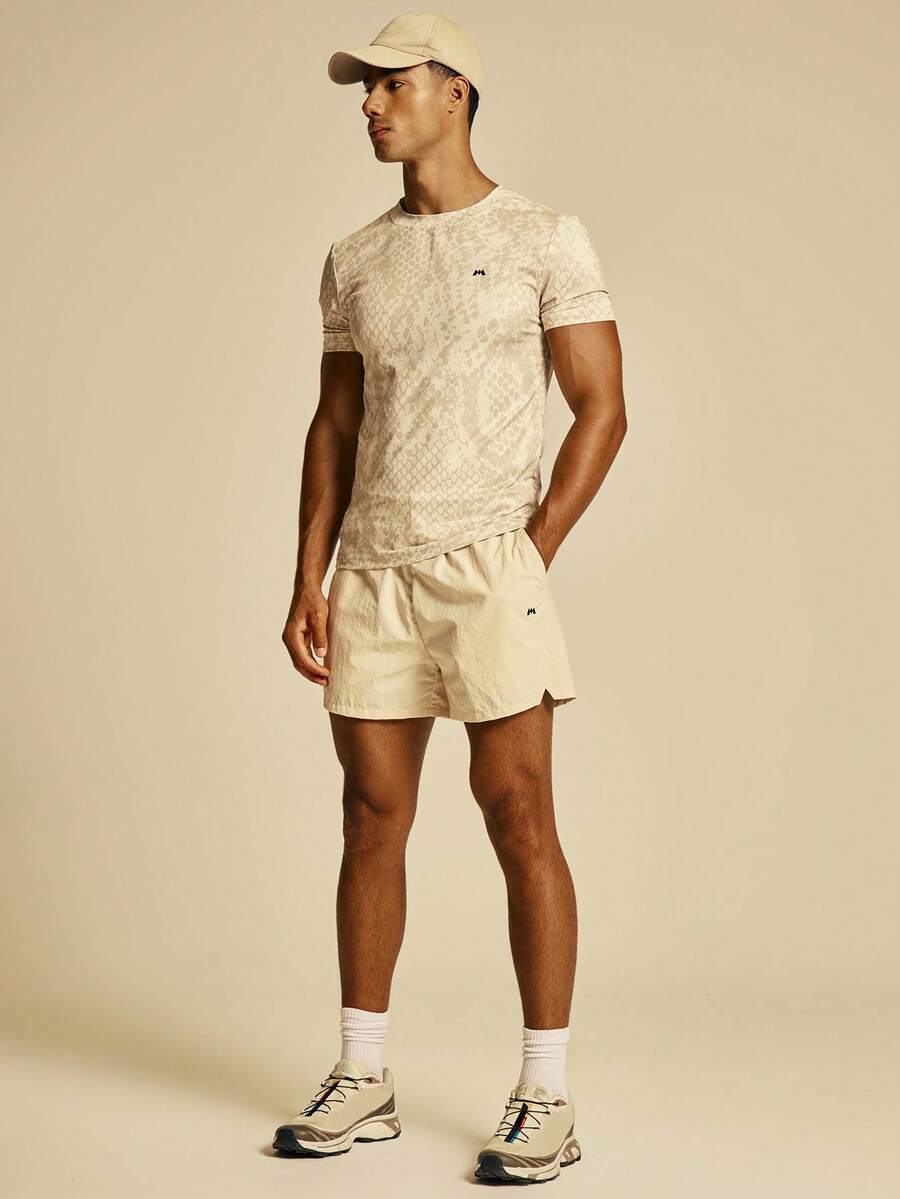 Musero Sport 輕量聚酯纖維健身短褲 後方拉鍊口袋 春夏必備健身運動服 - 米色 - 查看 1