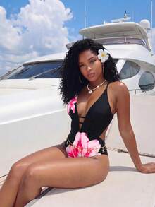 BamGleam Traje de baño de una pieza para mujer con escote en V profundo, espalda descubierta, lazos cruzados y estampado para vacaciones de verano en la playa, color negro - Negro - Ver 2
