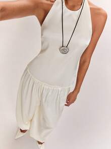 SHEIN BAE Conjunto de 2 piezas para mujer con top de tirantes halter sin espalda y pantalones farol en beige albaricoque, elegante y casual para ir al trabajo, uso diario, salidas casuales, conjunto práctico de satén albaricoque y blanco - Albaricoque - Ver 3