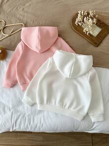 SHEIN LMoss Kids 買1送1，2件組女童純色連帽寬鬆休閒衛衣，度假風，休閒學院風，適合秋冬，日常休閒穿搭，學校，聖誕節，女童冬季服飾，聖誕套裝，派對套裝，日常上學，生日套裝，公主套裝，母女/姐妹套裝，柔軟舒適，天鵝絨面料 - 彩色 - 查看 2