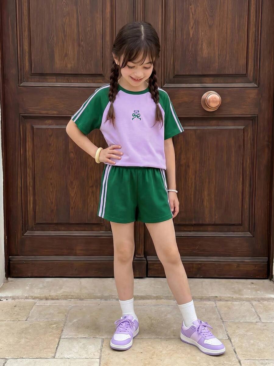 SHEIN Casuvi Kids Casuvi 青少年女孩 2 件套 紫色夏季可愛開學穿搭,針織 T 恤搭配梭織休閒短褲,卡通蝴蝶結印花,對比側條紋 - 紫丁香色 - 查看 1