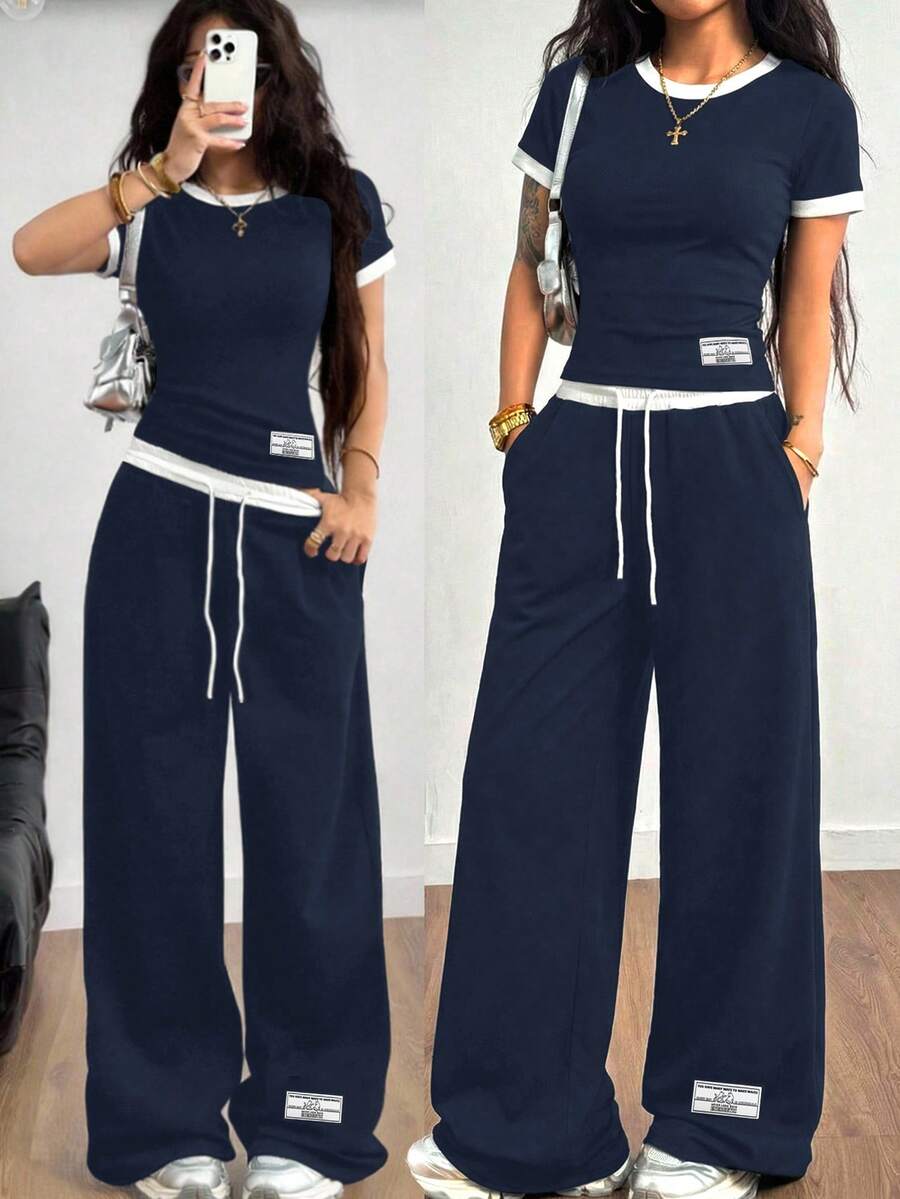 SHEIN 青少年女孩春夏時尚針織羅紋黑白對比色休閒修身基本款T恤與對比腰帶寬鬆長褲口袋套裝,梭織貼布,休閒運動街頭風,學院運動,返校,足球,戶外舒適穿搭 - 藏蓝色 - 查看 1