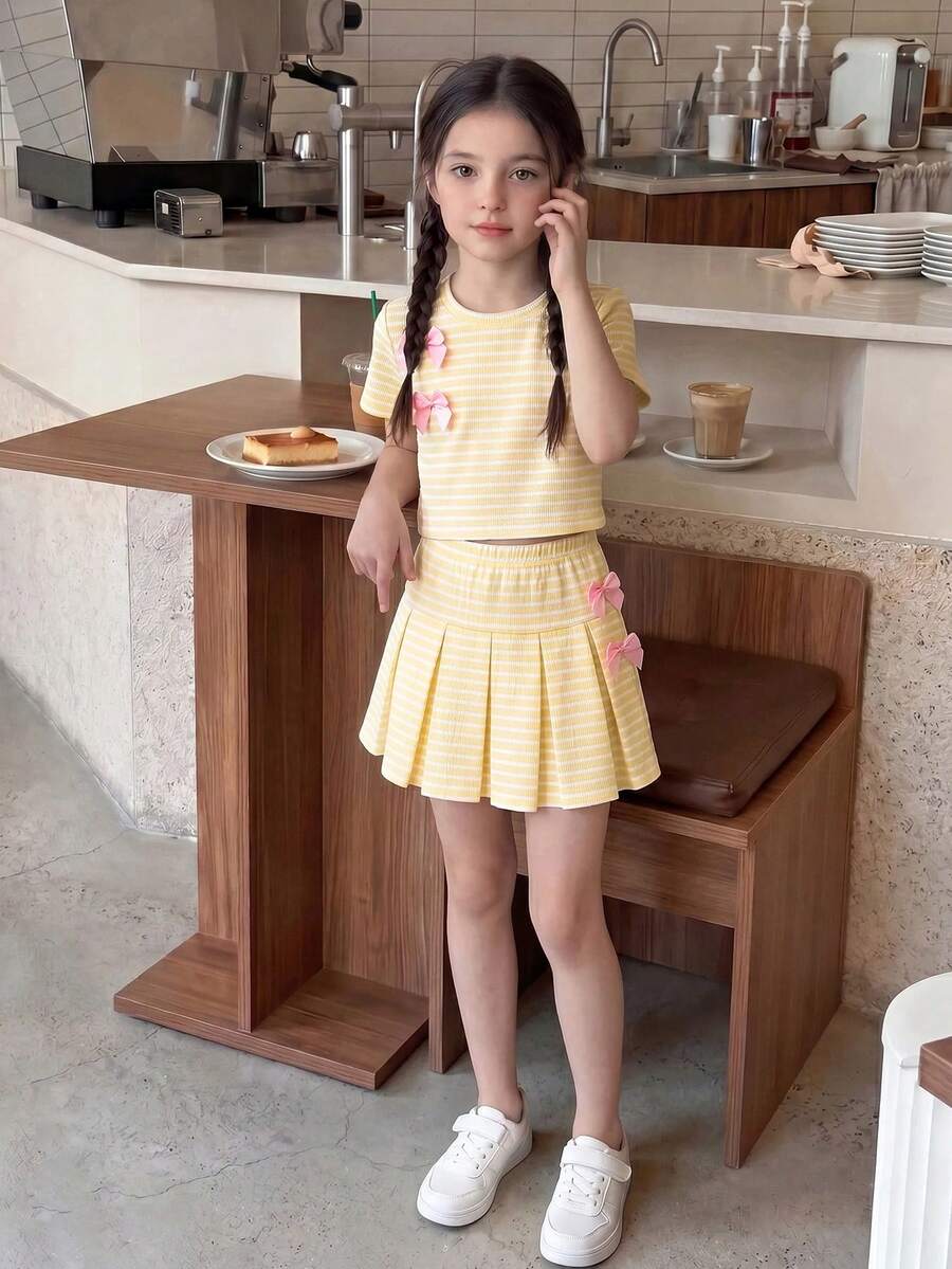 Casuvi Kids 青少年女孩圓領條紋拼接蝴蝶結裝飾短袖T恤與百褶裙休閒日常穿搭套裝 - 黃色 - 查看 1