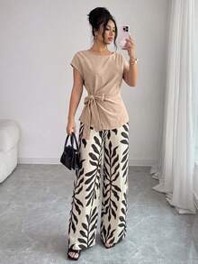 Elenzga Blouse décontractée sans manches ajustée pour femme, printemps/été, style élégant pour le travail, design plissé, taille cintrée et nœud papillon + Pantalon long décontracté pour femme, printemps/été, style élégant pour le travail, imprimé feuilles, taille cintrée, double poche, coupe ample à jambes larges - Multicolore - Voir 7