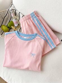 SHEIN 少女 T-shirt 套裝，運動風，粉色與深綠色拼接短袖 T-shirt 與短褲套裝，夏季寬鬆修身設計，輕量面料，適合日常穿著、休閒運動或搭配穿搭 - 粉色 - 查看 4