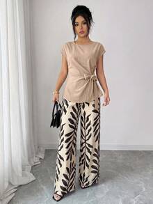 Elenzga Blouse décontractée sans manches ajustée pour femme, printemps/été, style élégant pour le travail, design plissé, taille cintrée et nœud papillon + Pantalon long décontracté pour femme, printemps/été, style élégant pour le travail, imprimé feuilles, taille cintrée, double poche, coupe ample à jambes larges - Multicolore - Voir 3
