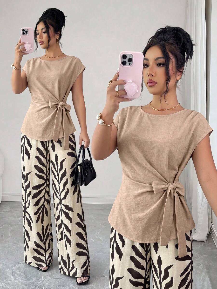 Elenzga Blouse décontractée sans manches ajustée pour femme, printemps/été, style élégant pour le travail, design plissé, taille cintrée et nœud papillon + Pantalon long décontracté pour femme, printemps/été, style élégant pour le travail, imprimé feuilles, taille cintrée, double poche, coupe ample à jambes larges - Multicolore - Voir 1