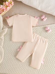 SHEIN Newborn Baby Girl Pink Black Fashion Set Short Sleeve Top With 3D Bow Cute Outfit For 0-9 M Babies - Beige - View 3