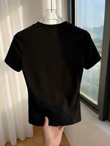 Franclia Damen einfarbiges Rundhals T-Shirt mit Knopfdekor, figurbetont, Kurzarm Tops für den täglichen Gebrauch, Schwarz-Gold, Sommer, Lässig, Elegant, Büro vielseitig weiches T-Shirt - Schwarz - Übersicht 2