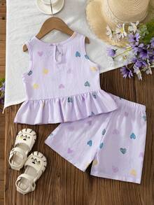 SHEIN Genkimix Kids 4-7歲女童夏季可愛甜美清新風套裝 泡泡皺紋水紋彩色小愛心荷葉邊無袖上衣 + 同款印花短褲 2件套 棉感紋理面料 親膚舒適輕盈 適合夏季戶外玩耍與日常休閒穿著 - 紫色 - 查看 2