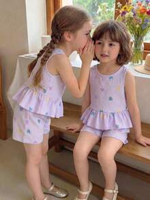 SHEIN Genkimix Kids 4-7歲女童夏季可愛甜美清新風套裝 泡泡皺紋水紋彩色小愛心荷葉邊無袖上衣 + 同款印花短褲 2件套 棉感紋理面料 親膚舒適輕盈 適合夏季戶外玩耍與日常休閒穿著 - 紫色 - 查看 6
