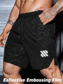 Gym Rark Pantalones cortos deportivos para hombre talla grande con estampado, bolsillo, cintura con cordón y película reflectante - Negro - Ver 1