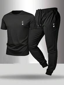 Gym Rark Conjunto deportivo de camiseta de manga corta con estampado de póker y pantalones para hombre - Negro - Ver 1