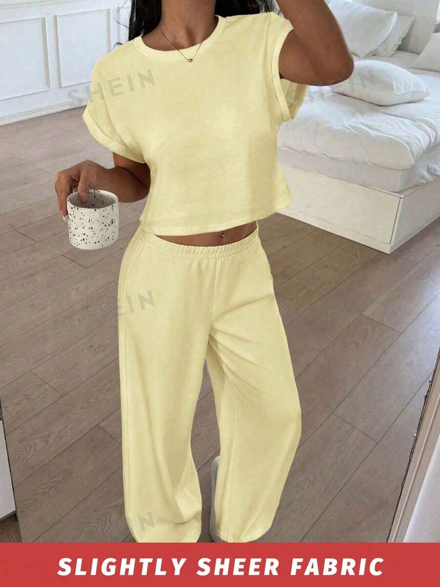 SHEIN 少女黄色宽松短袖露脐T恤和针织裤套装,休闲百搭,舒适柔软,适合度假、日常穿着以及春夏季节。 - 黃色 - 查看 1