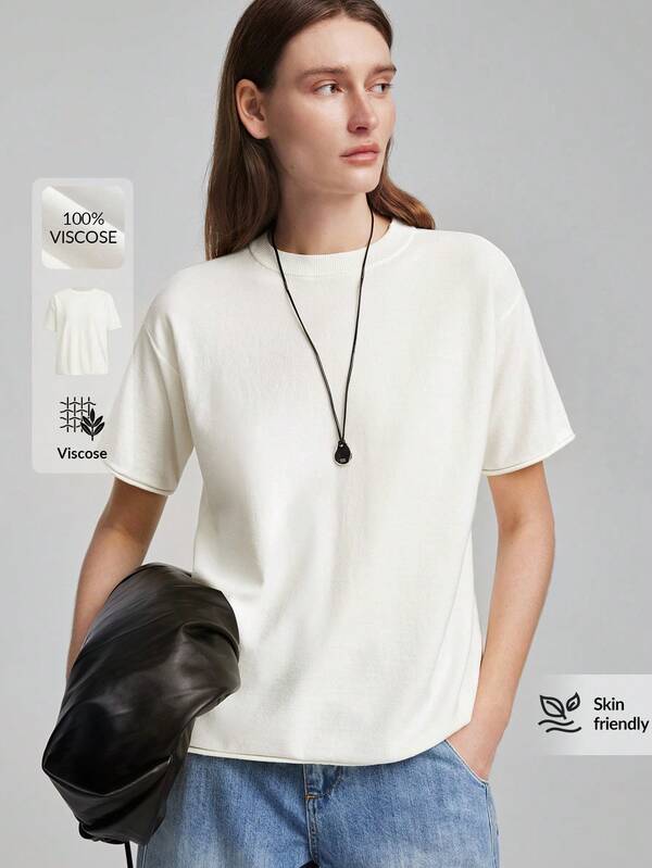 Ontre 2026 ny sommarstickad topp för kvinnor, lös passform, beige, kort ärm, rund hals, unisex, casual, pendling, urban, modern, minimalistisk, elegant, tebjudning, Independence Day, Old Money-stil, läraroutfit, kontorskläder för kvinnor, semesterklänning, semester- och dejtoutfit, ytterkläder för kvinnor, mångsidig stickad topp för kvinnor