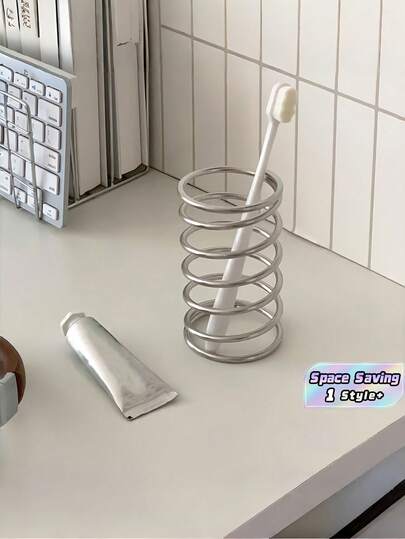 1 pieza Soporte de cepillo de dientes de acero inoxidable con diseño espiral hueco 2 en 1 Organizador de brochas de maquillaje y bolígrafos Estante de almacenamiento multifuncional de secado rápido para tocador de baño y escritorio Ahorra espacio Bandeja de escritorio Esencial para dormitorio