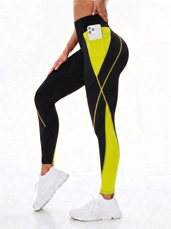 Exploreva Quần legging thể thao nữ thời trang cạp cao có túi, phối màu tương phản.
