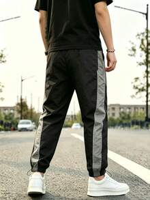 Gym Rark Pantalones de chándal tipo jogger con bloques de color y patchwork para hombre - Negro - Ver 2